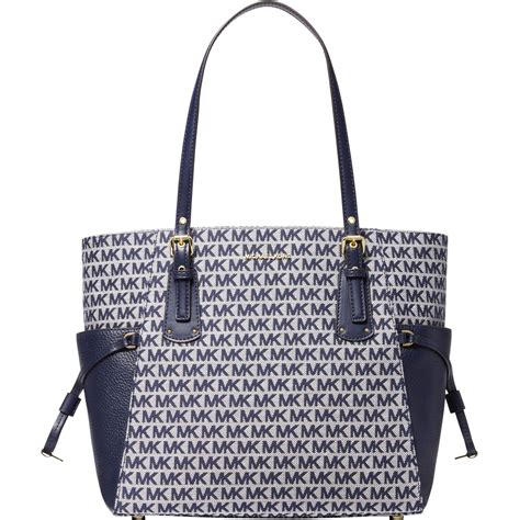 michael kors east west pocket tote|signature voyager east west tote.